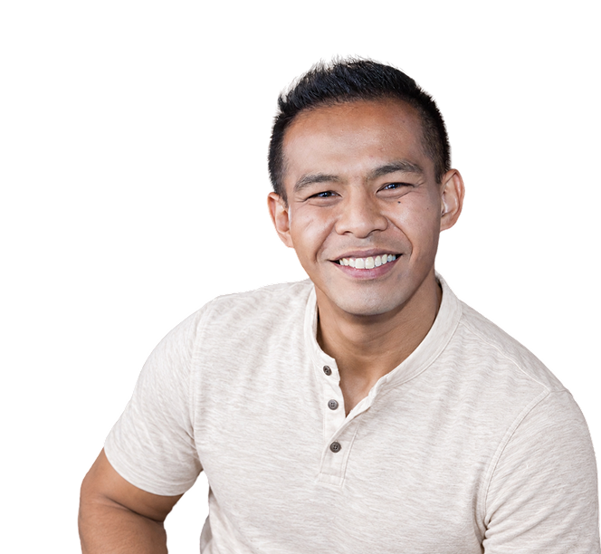 Ron C., a HairClub hair transplant patient, smiling after his procedure