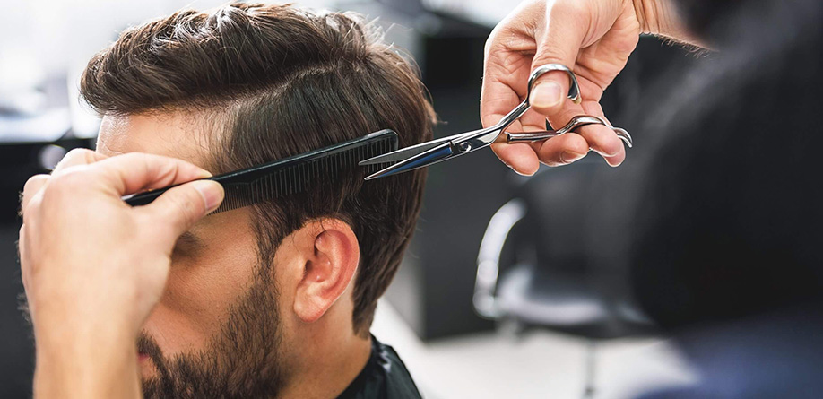 man receiving haircut