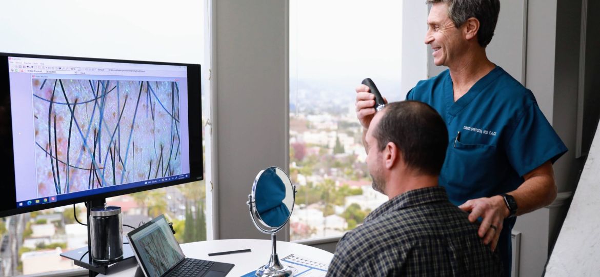 Dr Deutsch with a patient