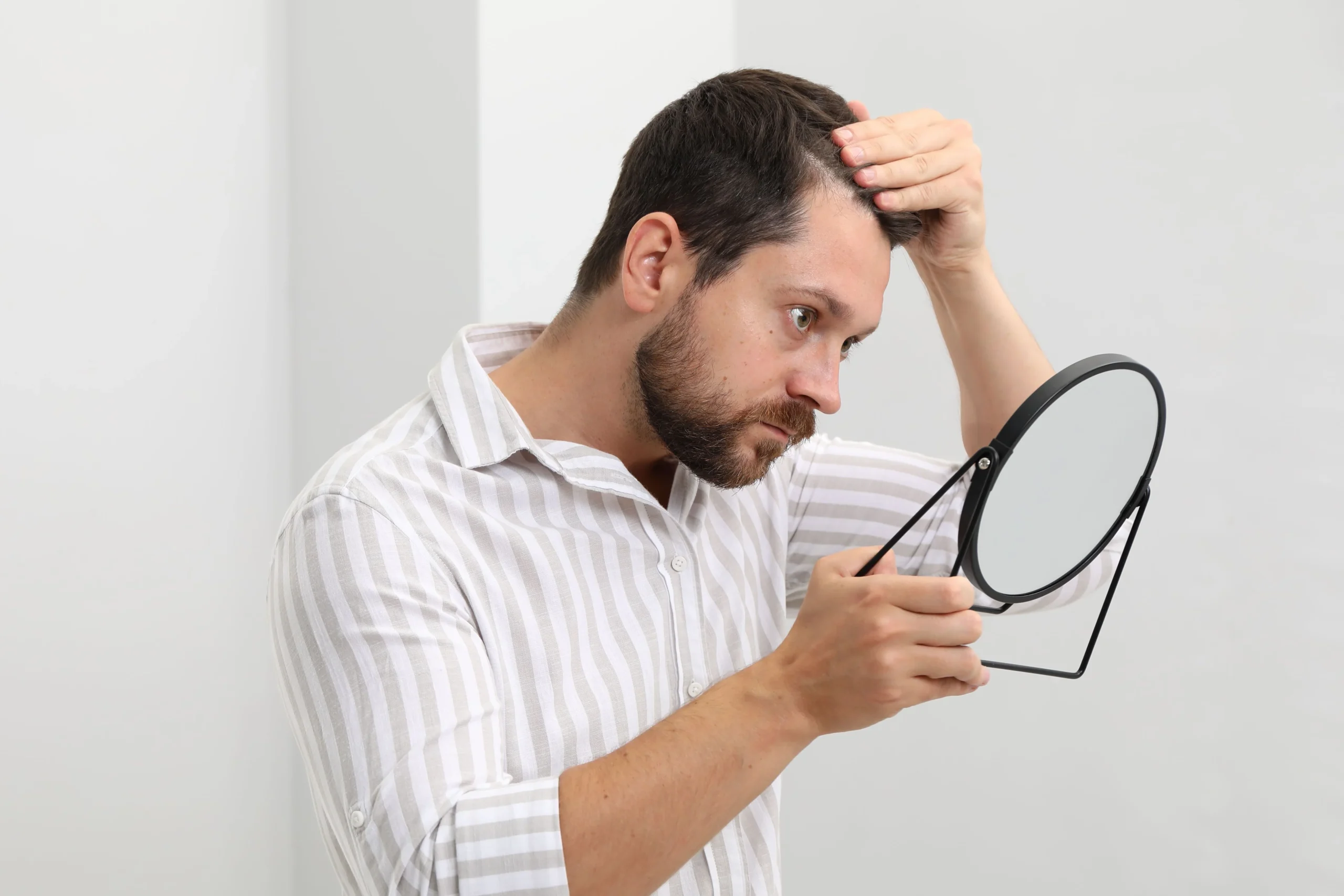 When You See These Early Signs of Hair Loss, Act Fast