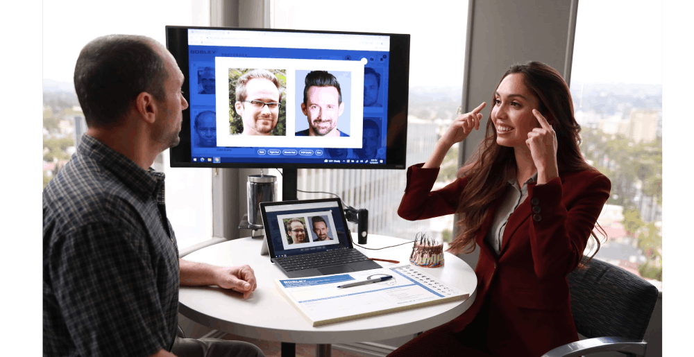 Who to See for a Hair Transplant consultation with a medical hair restoration specialist reviewing before-and-after results during a physician-led Bosley appointment